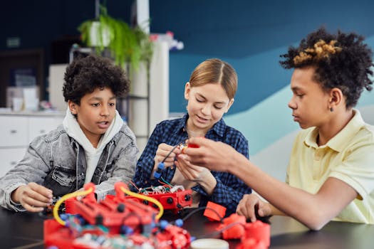 Diverse teens working together on a robotics project, showcasing teamwork and learning.